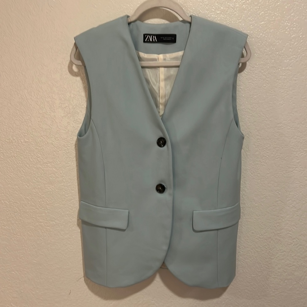 Teal blue vest